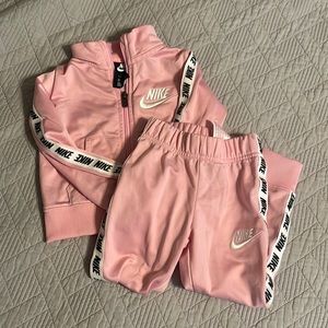 Pink Nike track suit